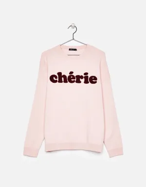 Oversized sweater with slogan